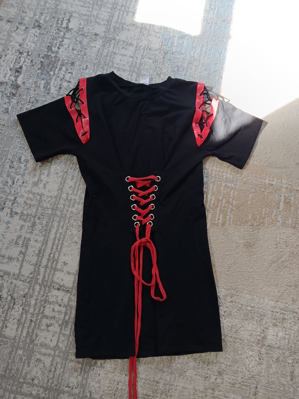 Black Mini Dress with Red Lace-Up Accents